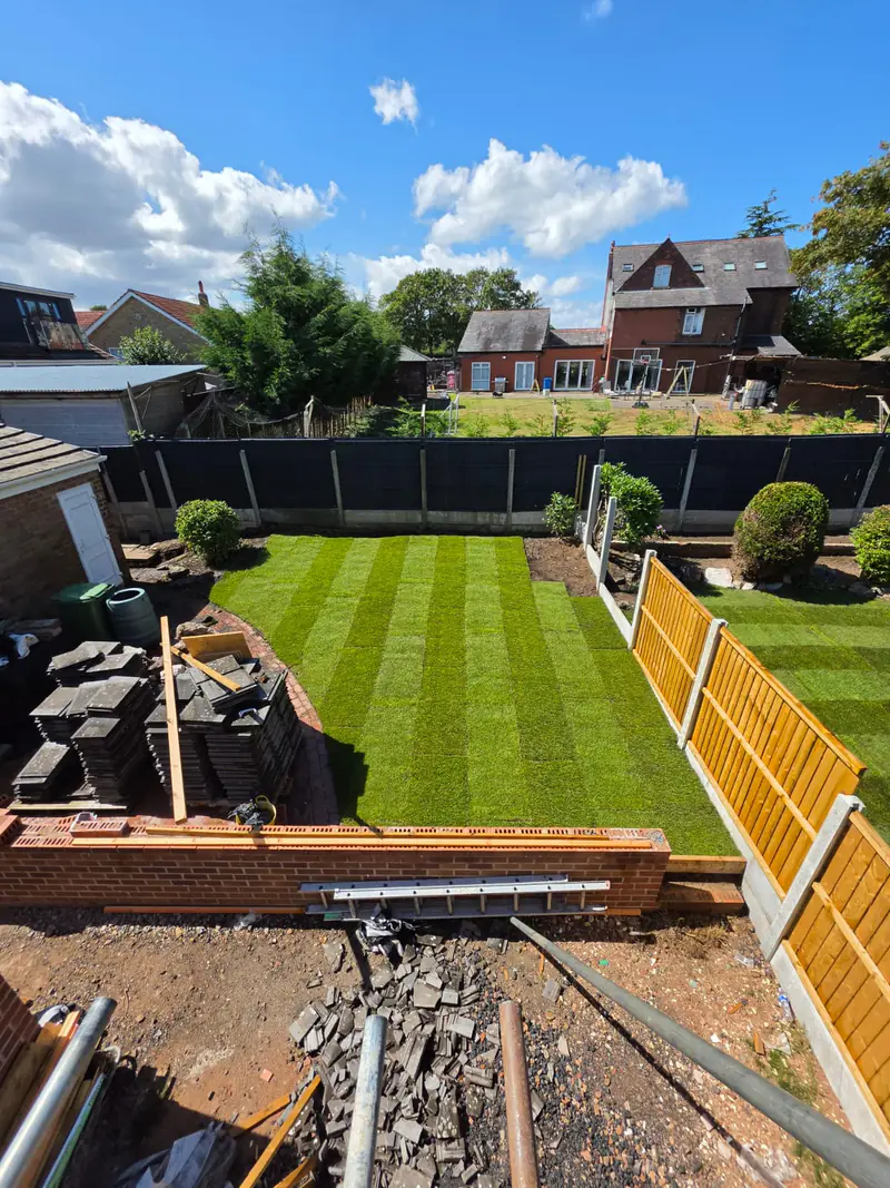 Freshly laid striped turf lawn in a Runcorn back garden